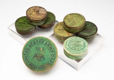 EIGHT AMERICAN PERCUSSION RIFLE CAP BOXES.