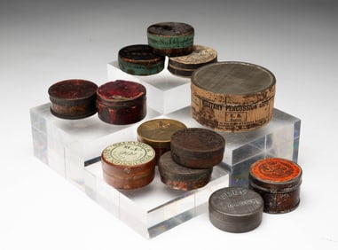 A COLLECTION OF PERCUSSION RIFLE CAP TINS.