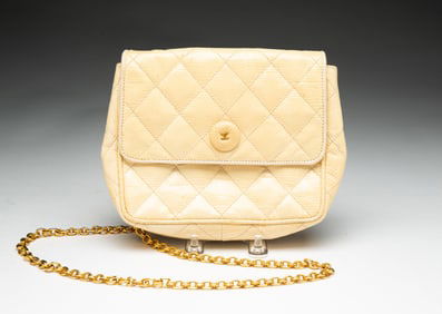 VINTAGE CHANEL LEATHER MINI BAG WITH CHAIN.