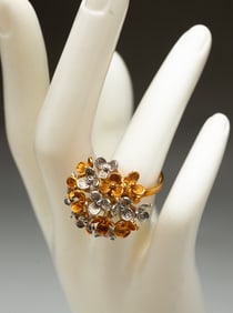 18K TWO-TONE GOLD FLOWER DOME RING.