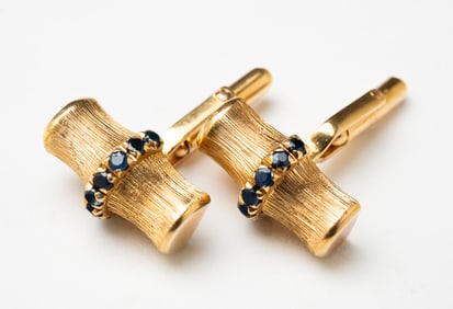 18K YELLOW GOLD AND SAPPHIRE BAMBOO CUFFLINKS.
