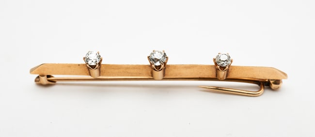 14K YELLOW GOLD DIAMOND BAR PIN.