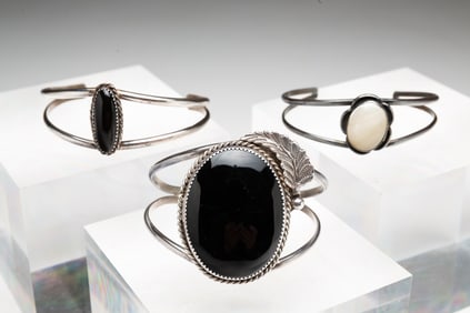 THREE NATIVE AMERICAN CUFF BRACELETS.