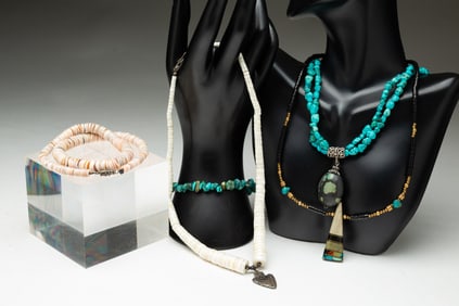 FOUR TURQUOISE AND STONE NECKLACES.