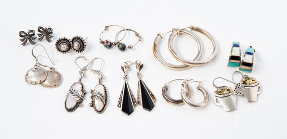 NINE PAIR OF STERLING SILVER EARRINGS.