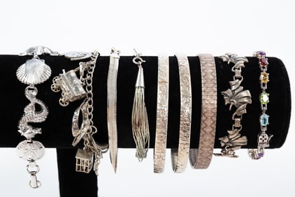 GROUP OF STERLING SIVLER BRACELETS.