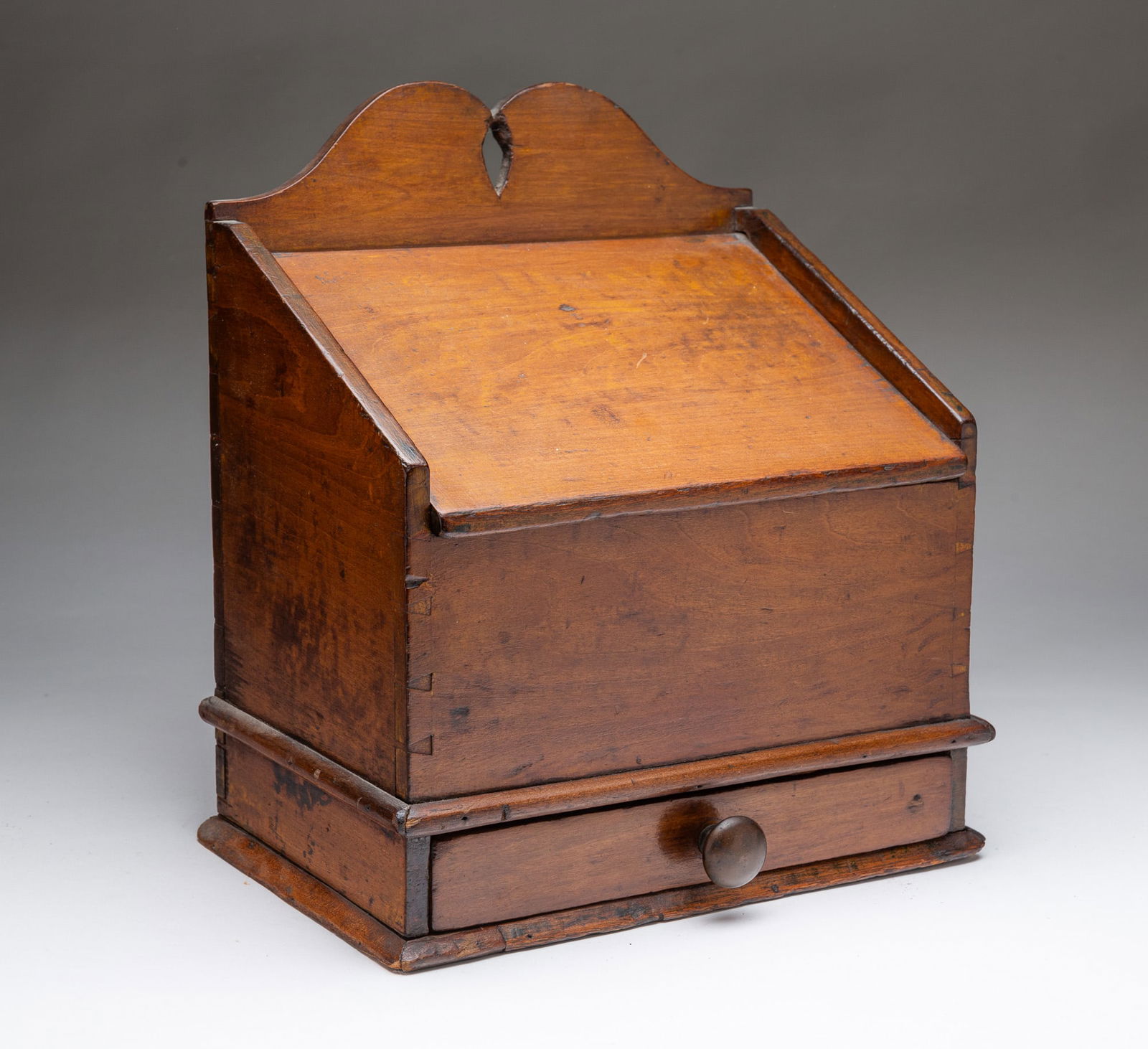 PENNSYLVANIA CHERRY SLANT-FRONT HANGING SALT BOX.