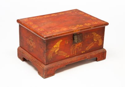 MINIATURE AMERICAN CHIPPENDALE RED-PAINTED AND STENCIL-DECORATED PINE BLANKET CHEST.