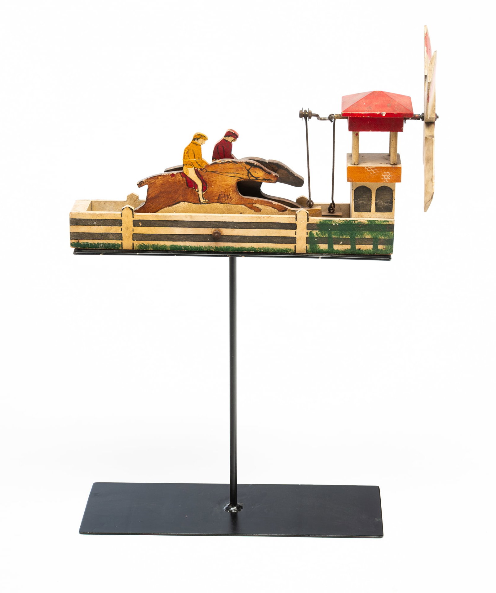 AMERICAN FOLK ART PAINT-DECORATED HORSE RACING WHIRLIGIG. (1 of 4)
