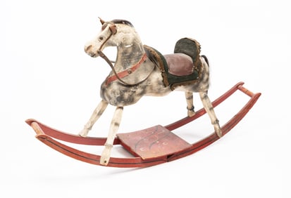 AMERICAN CARVED AND PAINT-DECORATED CHILD'S ROCKING HORSE.