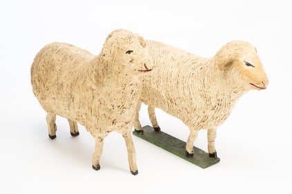 TWO LARGE GERMAN PAINTED WOOD AND COMPOSITION SHEEP.