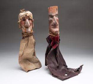 PAIR OF FOLK ART POLYCHROMED AND CARVED PINE PUNCH AND JUDY HAND PUPPETS.
