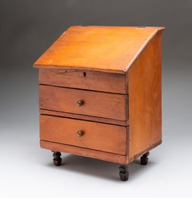 MINIATURE AMERICAN PINE TWO-DRAWER SLANT-FRONT DESK.