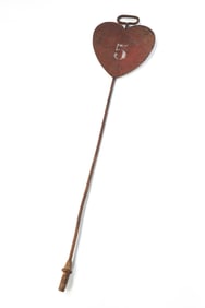 CRAWFORD, MCGREGOR, & CANBY CO. (DAYTON, OHIO) IRON HEART-SHAPED FIFTH HOLE GOLF MARKER.