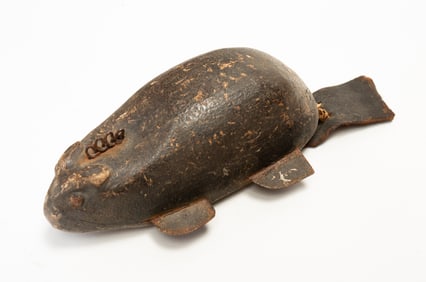 AMERICAN FOLK ART CARVED AND PAINTED BEAVER ICE FISHING DECOY.