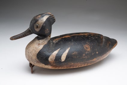 REGGIE BIRCH (VIRGINIA, B. 1953) FOLK ART CARVED AND PAINTED MERGANSER DECOY.