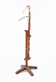 STANDING IRON RUSH LIGHT WITH RATCHET BASE.