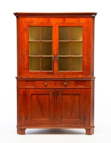 PENNSYLVANIA PAINT-DECORATED POPLAR AND PINE CORNER CUPBOARD.