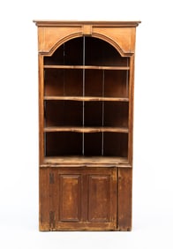 AMERICAN PINE ARCHITECTURAL BARREL-BACK CUPBOARD.
