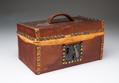 DIMINUTIVE AMERICAN LEATHER-COVERED PINE BOX WITH BRASS TACKS.