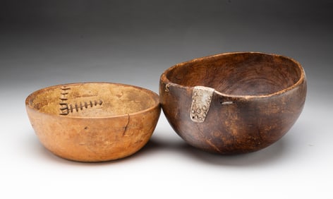 TWO AMERICAN CARVED WOOD BOWLS WITH MAKE-DO REPAIRS.