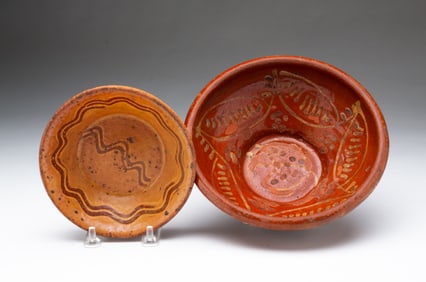 TWO AMERICAN SLIP-DECORATED REDWARE BOWLS.