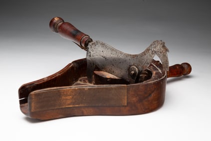 ENGLISH FOLKSY FORGED STEEL HORSE-FORM CHOCOLATE CUTTER.