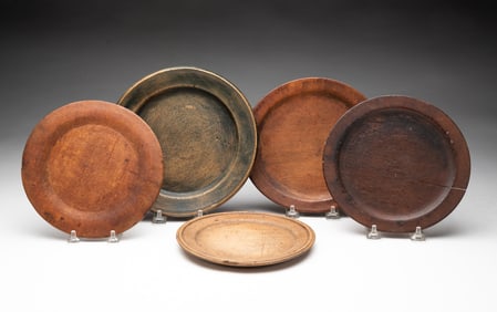 FIVE AMERICAN TREENWARE PLATES.