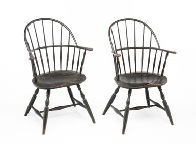 PAIR OF CONNECTICUT EBONIZED SACK-BACK WINDSOR ARMCHAIRS.