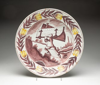 DELFT BIBLICAL SHALLOW BOWL WITH MANGANESE AND YELLOW DECORATION.