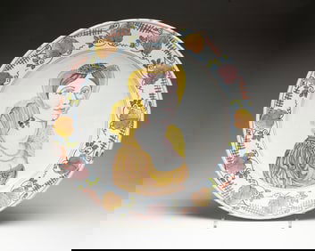 DELFT PORTRAIT SHALLOW BOWL WITH MANGANESE AND YELLOW DECORATION.