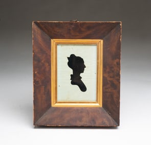 AMERICAN HOLLOW-CUT SILHOUETTE OF A WOMAN SIGNED "H.F. BROWN".