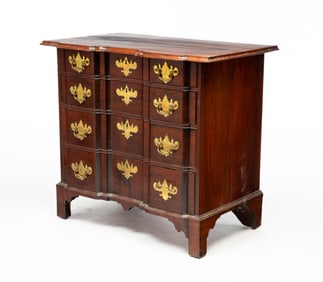 DIMINUTIVE MASSACHUSETTS CHIPPENDALE HONDURAN MAHOGANY FOUR-DRAWER BLOCKFRONT CHEST.