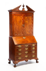 MASSACHUSETTS CHIPPENDALE CARVED MAHOGANY REVERSE-SERPENTINE SECRETARY BOOKCASE.