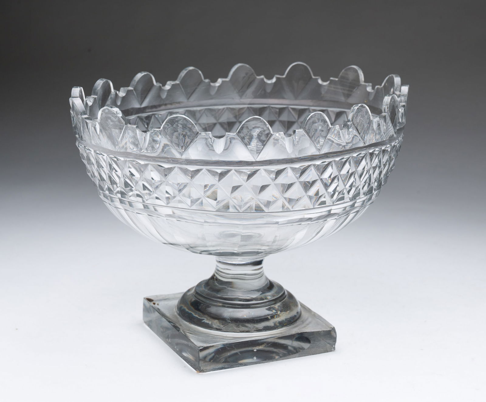 ANGLO-IRISH CUT GLASS OVAL BOWL ON PEDESTAL. (1 of 4)