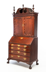 FINE MASSACHUSETTS CHIPPENDALE MAHOGANY SERPENTINE-FRONT SECRETARY DESK-AND-BOOKCASE.