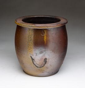 ONE GALLON SLIGHTLY OVOID STONEWARE JAR.