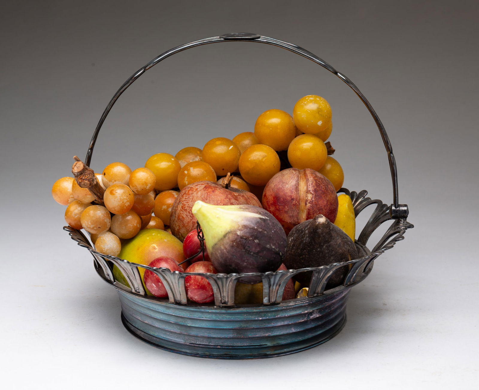GROUP OF STONE FRUIT IN SILVER PLATE BASKET. (1 of 6)
