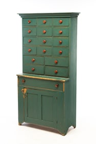AMERICAN BLUE-GREEN PAINTED PINE STEPBACK APOTHECARY CUPBOARD.