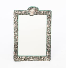 ENGLISH PIERCED STERLING SILVER REPOUSSE DRESSER MIRROR.