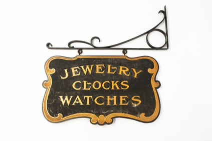 AMERICAN BLACK-SMALTZED AND PARCEL-GILT DOUBLE-SIDED "JEWELRY, CLOCKS, WATCHES" TRADE SIGN.