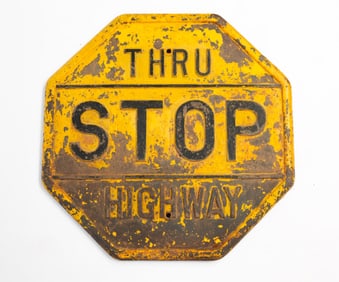 CAST IRON ROAD SIGN.