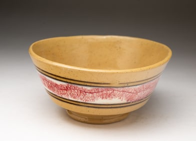 YELLOWWARE BOWL WITH PINK MOCHA SEAWEED DECORATION.