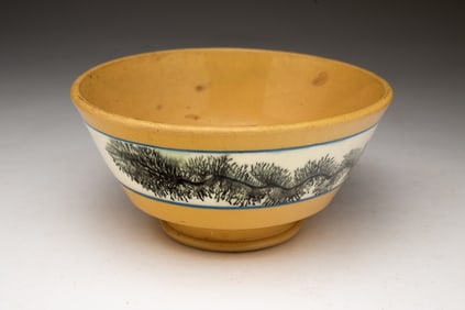 YELLOWWARE BOWL WITH BLACK MOCHA SEAWEED DECORATION.