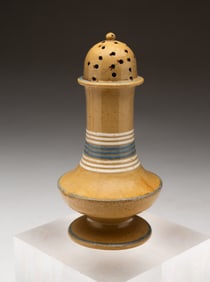 YELLOWWARE PEPPER POT WITH MOCHA DECORATION.