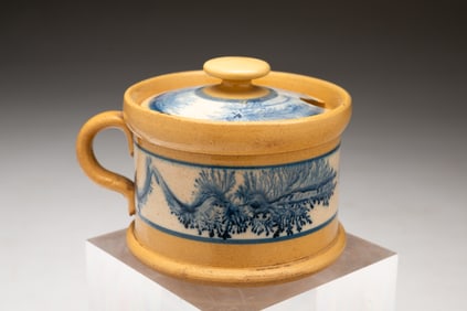 YELLOWWARE LIDDED MUSTARD POT WITH BLUE MOCHA SEAWEED DECORATION.