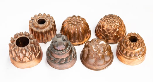 SEVEN EUROPEAN COPPER FOOD MOLDS.