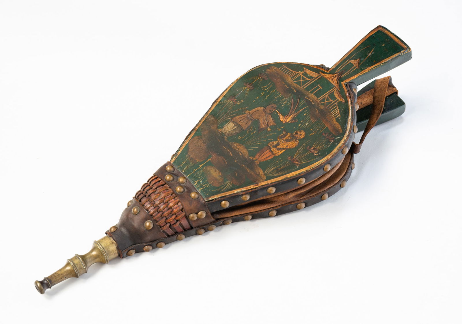 AMERICAN PAINT-DECORATED FIREPLACE BELLOWS.: Mid-19th Century. Green ground with brass tack trim, painted in the Chinese taste with a pagoda above a bird and two figures, with a leather strap on one handle. 12"l.Provenance: From the Collection o