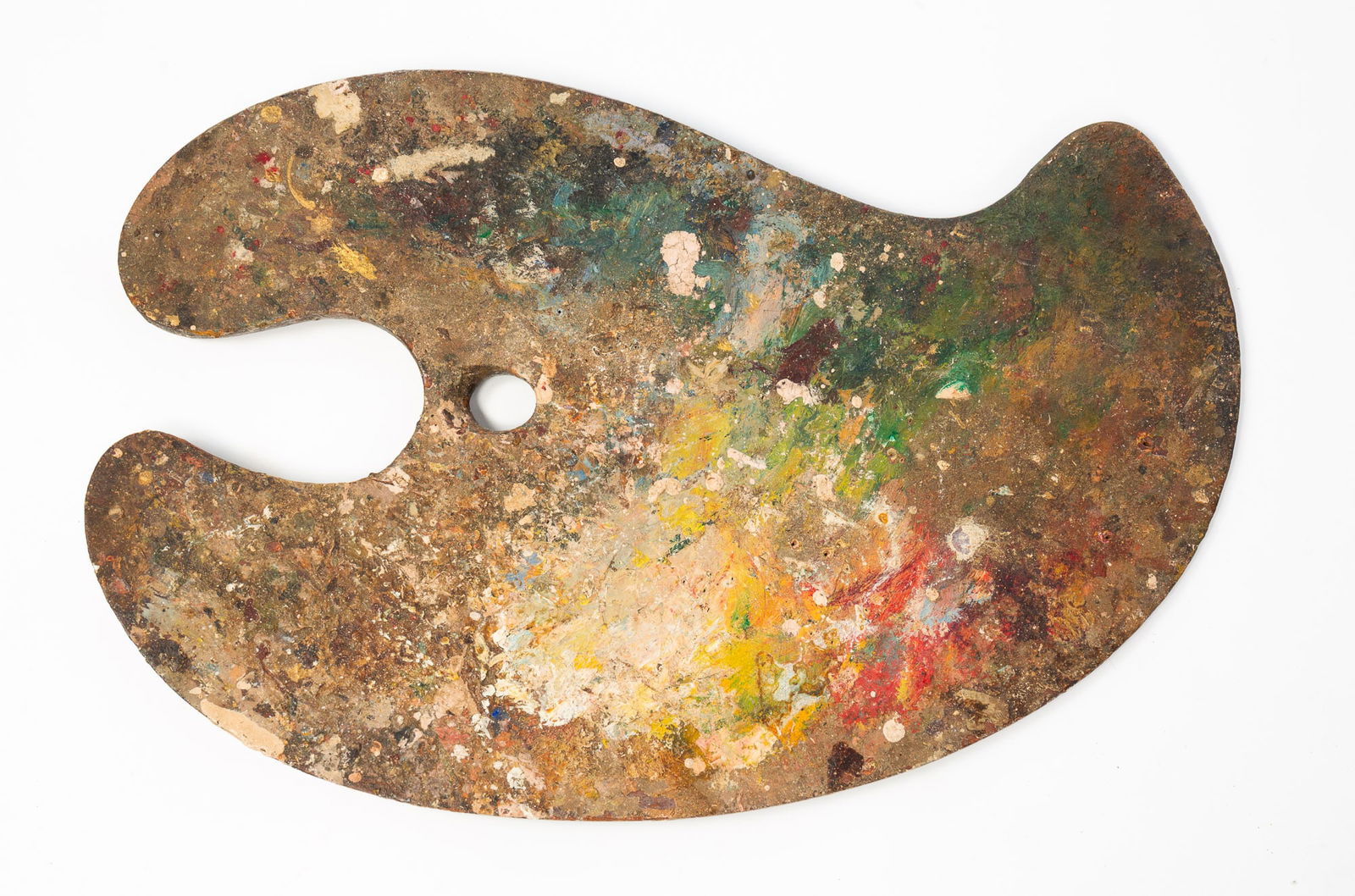 FOLKSY ARTIST'S PALLET.: American, Early 20th Century. Mahogany. Heavily used in traditional form. 24"w. 16"d.