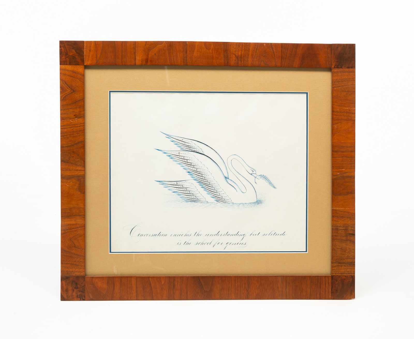 CONTEMPORARY SPENCERIAN WITH SWAN.: American, Late 20th Century. Ink on paper. Blue swan to center with phrase to bottom reading "Conversation enriches the understanding but solitude is the school for geniuses". In a mahogany veneer fra